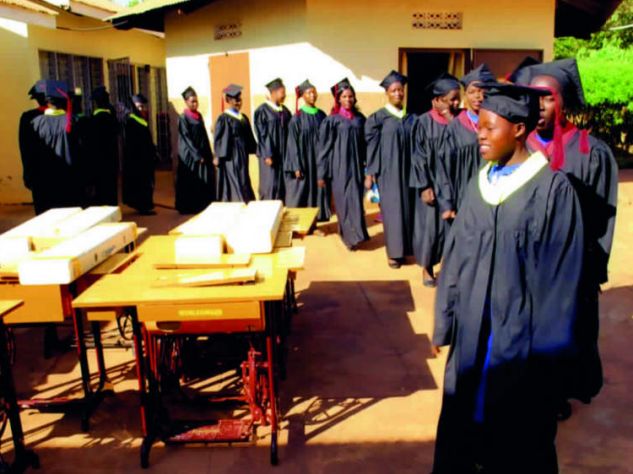 Students line up on graduation day to receive their certificates,