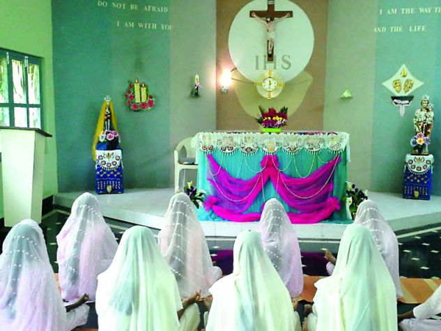 Indian nuns during Eucharistic Adoration
